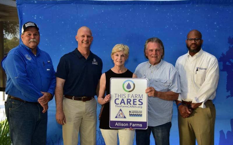 Carl and Joan Allison (center), of Columbia County, were recognized by the Florida Farm Bureau’s County Allicance for Responsible Environmental Stewardship (CARES) program on May 5. Joining the Allisons are Suwannee River Water Management Director Hugh Thomas (from left), Florida Farm Bureau President Jeb S. Smith and Andra Johnson, the UF/IFAS dean of extension and director of the Florida Cooperative Extension Service. (Photos by ROB WOLFE/Special to the Reporter)