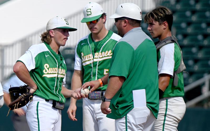 Suwannee head coach Justin Bruce pulls pitcher Matthew Gill from the mound during the Class 4A state semifinals on Monday at Hammond Stadium in Fort Myers. (CHRIS TILLEY/Special to the Reporter)