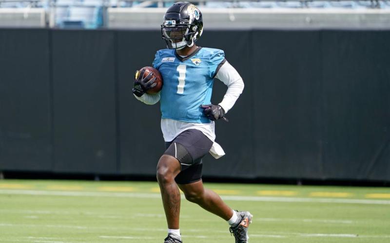 Jacksonville Jaguars running back Travis Etienne practices a punt return drill during practice on Monday in Jacksonville. (JOHN RAOUX/Associated Press)