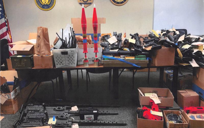 A stash of weapons found at the residence of Dustin and Greg Eward was siezed by authorities during their investigation. (COURTESY)
