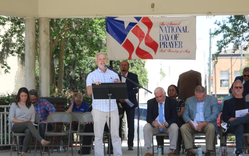 Matt Glover, New Life Christian Fellowship pastor, prays during the National Day of Prayer event Thursday. (TONY BRITT/Lake City Reporter)