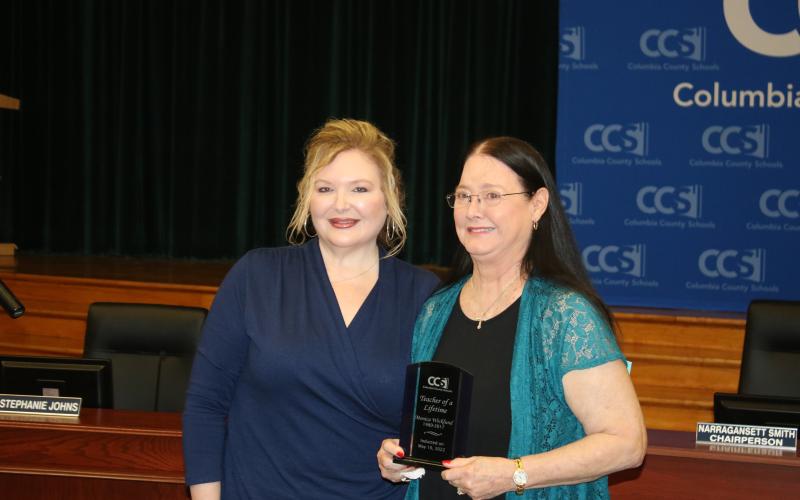 Monica Wicklund was selected for the ‘Teacher of a Lifetime’ award by school board member Stephanie Johns. (TONY BRITT/Lake City Reporter)