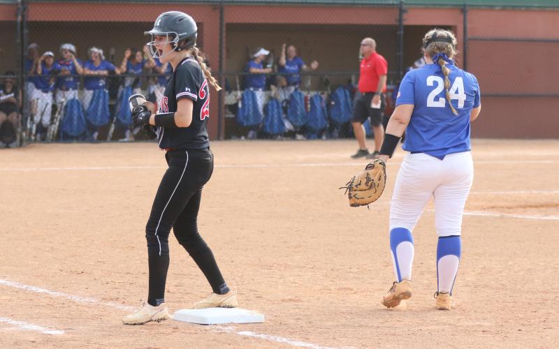 Fort White’s Maddy Keen celebrates on first base after hitting a single against Jay during the Class 1A state championship game at Legends Way Ballfields on Wednesday in Clermont. (MORGAN MCMULLEN/Lake City Reporter)