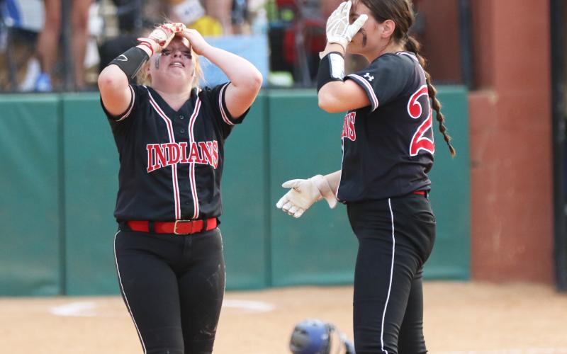 Fort White outfielder Gracie Clemons (left) reacts next to pitcher Kadence Compton after making the final out of the Class 1A state championship against Jay at Legend Way Ballfields on Wednesday in Clermont. The Royals won 6-5, holding on after the Indians loaded the bases with two outs in the seventh inning. (MORGAN MCMULLEN/Lake City Reporter)