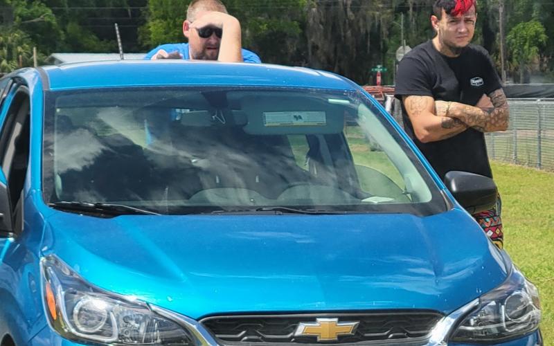 David Spears (left) and Tyler Hovey were arrested after spotted driving around the Melrose Park Elementary School playground during dismissal Friday afternoon. (COURTESY)