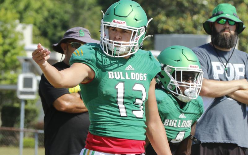 Suwannee quarterback Bronsen Tillotson signals to a teammate during Wednesday’s practice. (JAMIE WACHTER/Lake City Reporter)