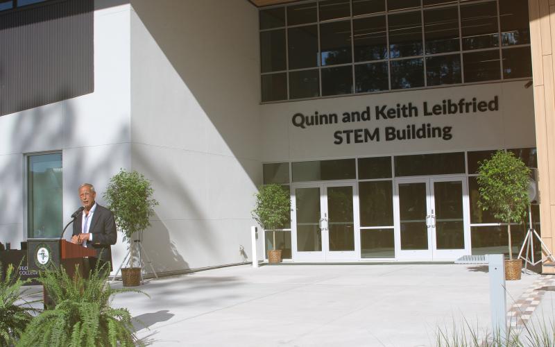 Keith Leibfried speaks during grand opening ceremony of the Quinn and Keith Leibfried STEM Building on the Florida Gateway College on Thursday. (TONY BRITT/Lake City Reporter)