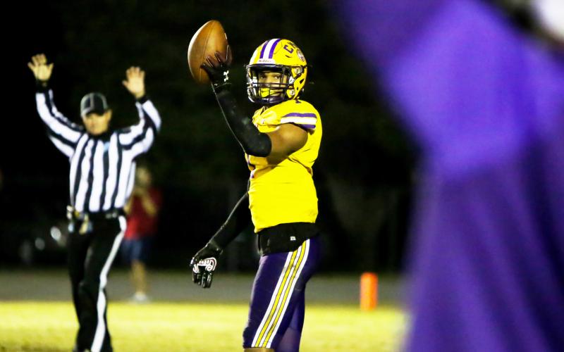 Columbia cornerback Amare Ferrell reacts after making an interception against Riverside during the Region 1-6A quarterfinals last season. (FILE)