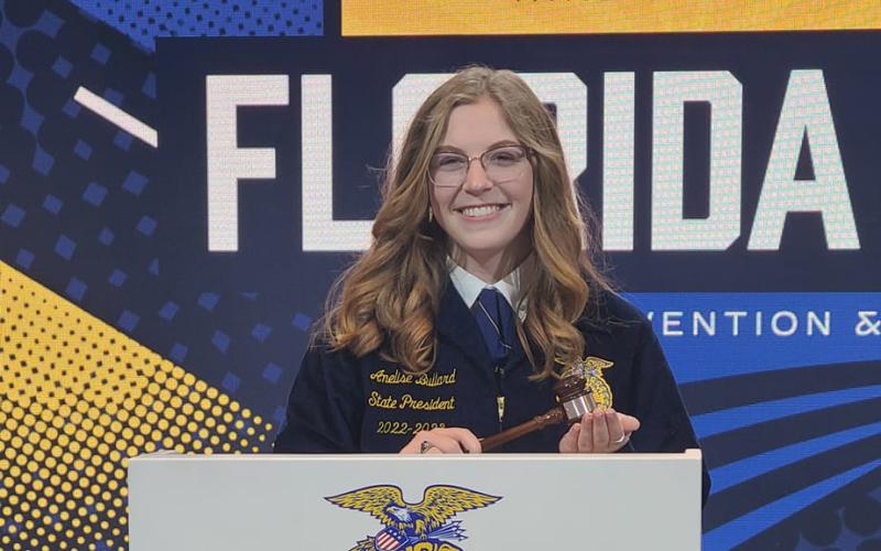 Anelise Bullard holds the gavel after being elected as the Florida FFA State President. (COURTESY)