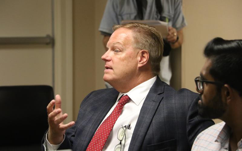 Meridian Behavioral Healthcare Inc. CEO Don Savoie expands on an idea during the Lake Shore Hospital Authority’s Monday meeting. (MORGAN MCMULLEN/Lake City Reporter)