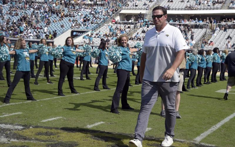 Former Jacksonville Jaguars player Tony Boselli is honored on the field during halftime of a game against the New Orleans Saints on Oct. 13, 2019, in Jacksonville. Boselli will be inducted into the Pro Football Hall of Fame on Aug. 6. (PHELAN M. EBENHACK/Associated Press)