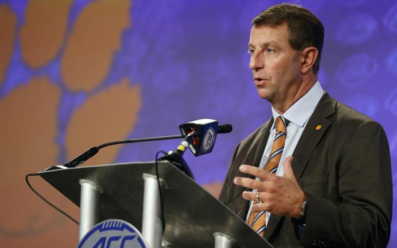 Clemson head coach Dabo Swinney answers a question at ACC Media Days on July 20 in Charlotte, N.C. (NELL REDMOND/Associated Press)