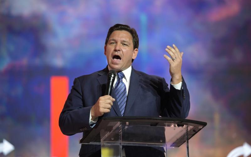 Florida Gov. Ron DeSantis addresses attendees during the Turning Point USA Student Action Summit on Friday in Tampa. (PHELAN M. EBENHACK/Associated Press)