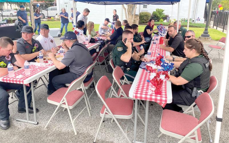 First responders from the Lake City Fire Department, Lake City Police Department and Columbia County Sheriff’s Office enjoyed the luncheon last July. (FILE)