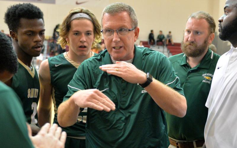 Dave Ruemenapp, pictured above during his time as Saint Stephen’s Episcopal’s boys basketball coach, brings most of his coaching experience to Columbia’s golf team from his time on the hardwood. (MIKE LANG/Herald-Tribune)