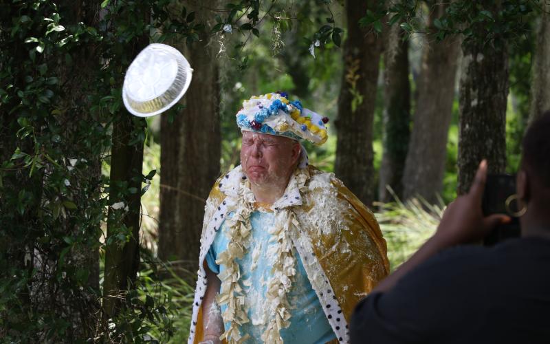 Lifestyle Enrichment Center Executive Director David Huckabee braces for impact as a whipped cream pie flies at him during Columbia County Senior Services’ 50th anniversary celebration on Thursday. (MORGAN MCMULLEN/Lake City Reporter)