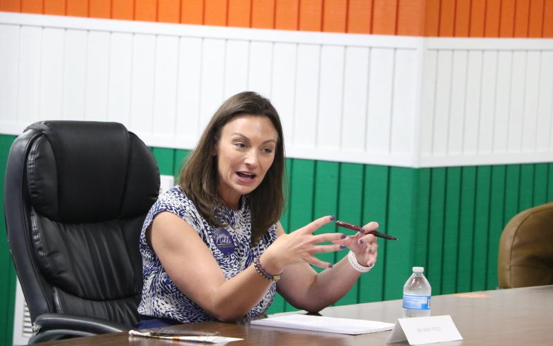 Nikki Fried, speaking at a Lake City event Saturday, is challenging federal law that bars medical-marijuana patients from purchasing firearms. (MORGAN MCMULLEN/Lake City Reporter)