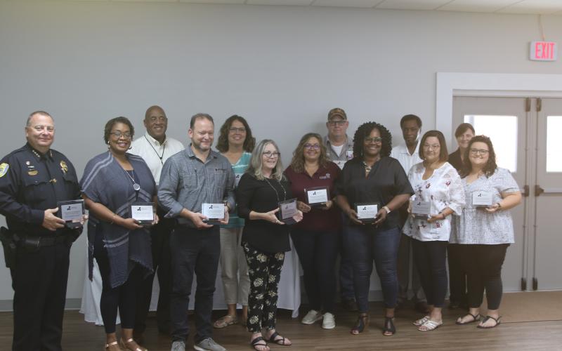 Employers involved with the CareerSource Florida Crown Summer Youth Employment Program pose with awards they received for participating in the program during the program’s banquet on Friday. (TONY BRITT/Lake City Reporter)