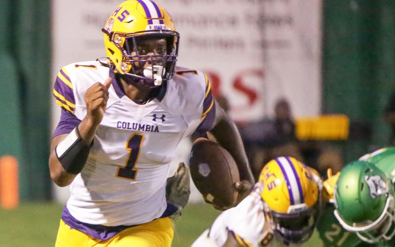 Columbia quarterback Tyler Jefferson carries the ball up the field during Friday’s Preseason Classic against Suwannee. (BRENT KUYKENDALL/Lake City Reporter)