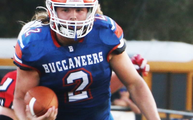 Branford running back Caden Coker rushes up the field against Fort White during the teams' Preseason Classic on Aug. 19. (MORGAN MCMULLEN/Lake City Reporter)