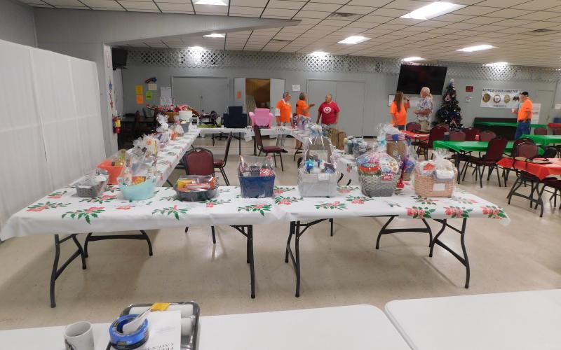 Baskets of donated goods sit in the halls of the American Legion Post 57 ahead of Saturday’s auction. (COURTESY)
