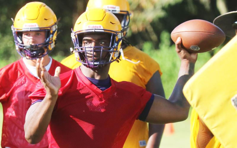 Columbia quarterback Tyler Jefferson throws a pass during Tuesday’s practice. (JORDAN KROEGER/Lake City Reporter)