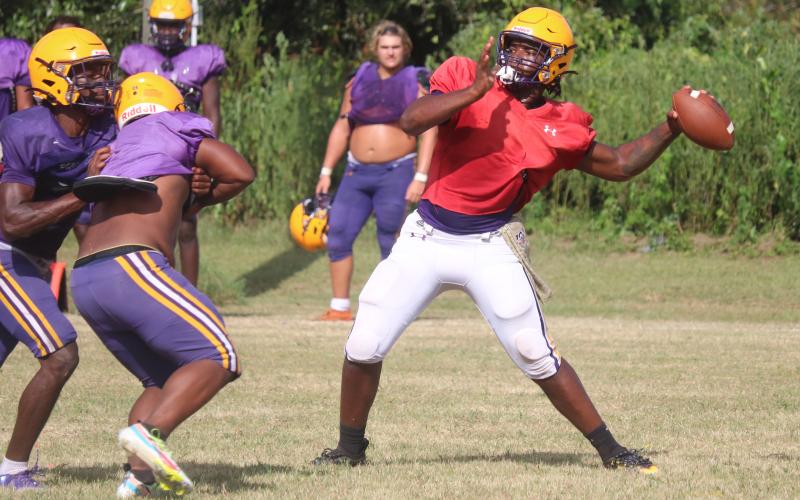 Columbia quarterback Tyler Jefferson throws a pass during practice on Aug. 12. (JORDAN KROEGER/Lake City Reporter)