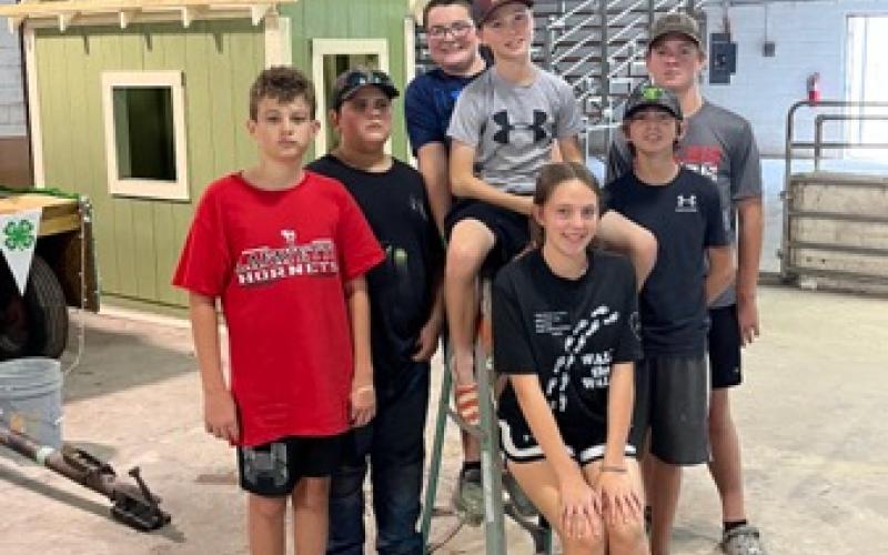 Lafayette 4-H Build it Camp participants pose for a picture in front of the playhouse before putting the roof on. (COURTESY LAFAYETTE COUNTY 4-H)