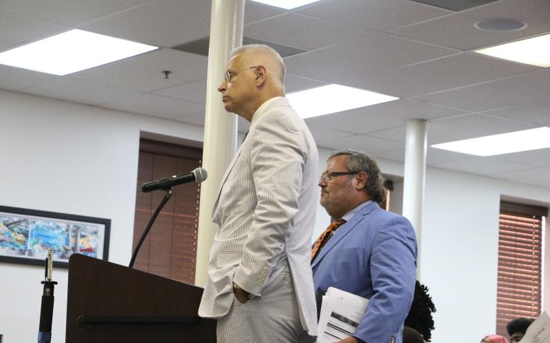 Todd Kennon with Robinson, Kennon &amp; Kendron (right) and Scott Walker of Folds Walker in Gainesville proposed teaming up to serve as the City of Lake City attorney at Thursday’s Lake City Council meeting. (MORGAN MCMULLEN/Lake City Reporter)