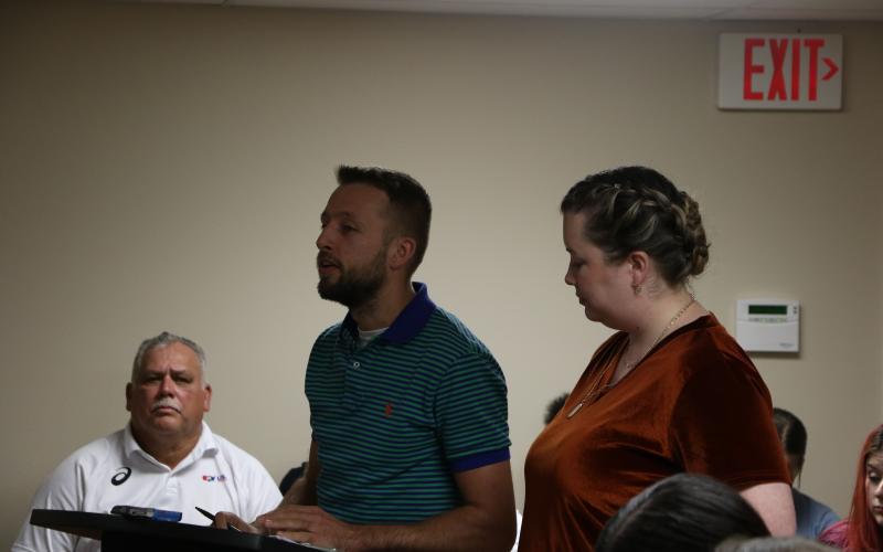 Garrett Morrison, left, and Destiny Evans discussed Remnant Ministries’ vision for the main Lake Shore Hospital building. (MORGAN MCMULLEN/Lake City Reporter)