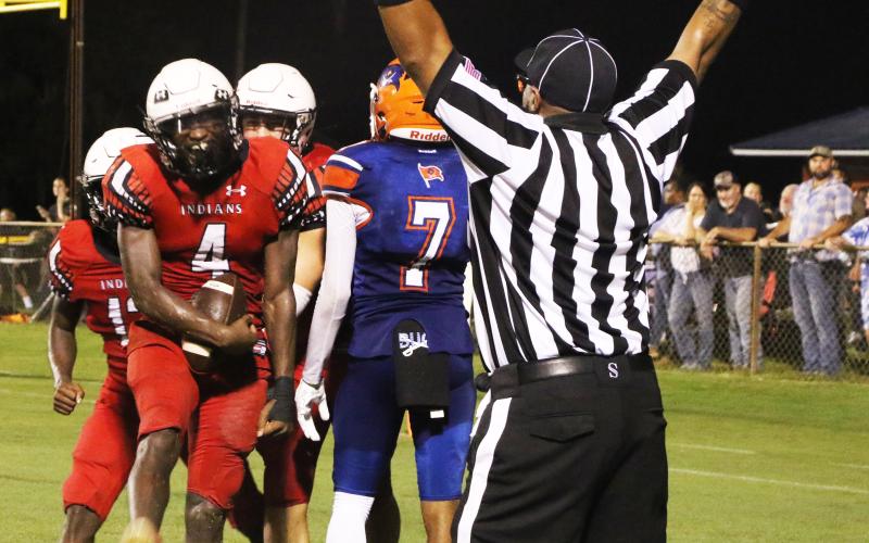 Fort White fullback Maliki Clark celebrates after scoring a touchdown against Branford during Friday's Preseason Classic. (MORGAN MCMULLEN/Lake City Reporter)