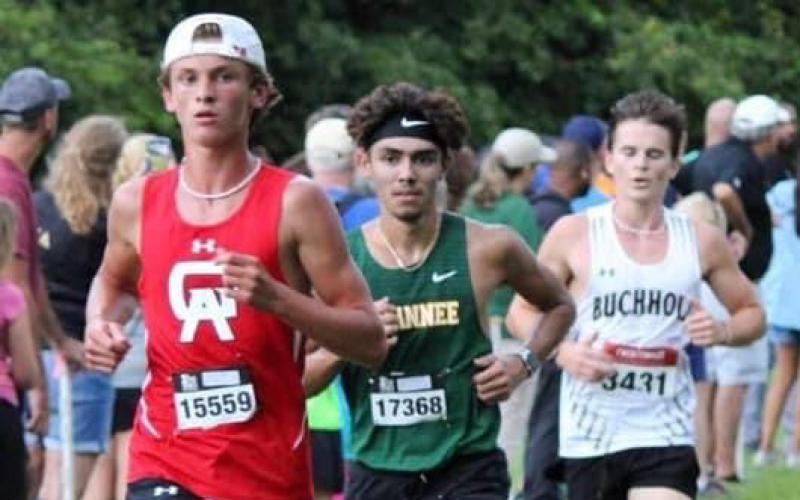 Suwannee’s Morgan Mobley (right) runs during the Cecil Field Summer Classic on Friday. (COURTESY)