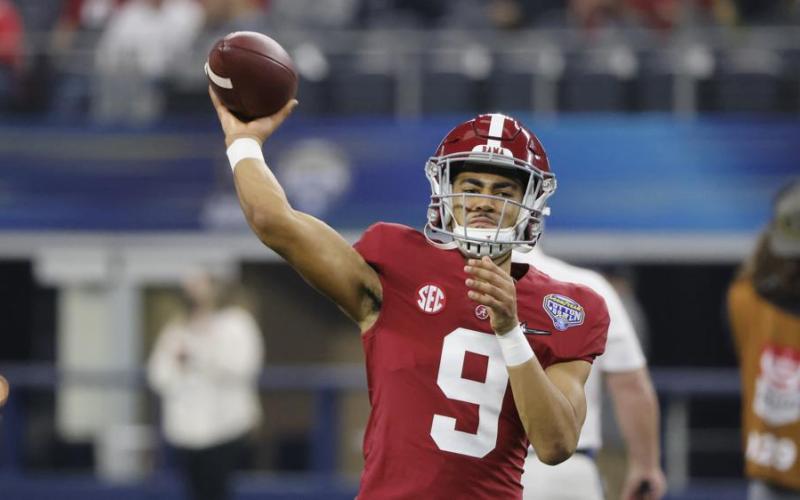 Alabama quarterback Bryce Young throws a pass against Cincinnati during the Cotton Bowl College Football Playoff semifinal on Dec. 31, 2021, in Arlington, Texas. (MICHAEL AINSWORTH/Associated Press))