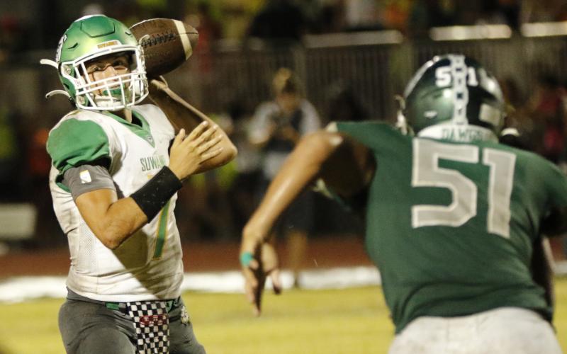 Suwannee quarterback Bronsen Tillotson sets to throw a pass against Flagler Palm Coast on Friday night. (JAMIE WACHTER/Lake City Reporter)