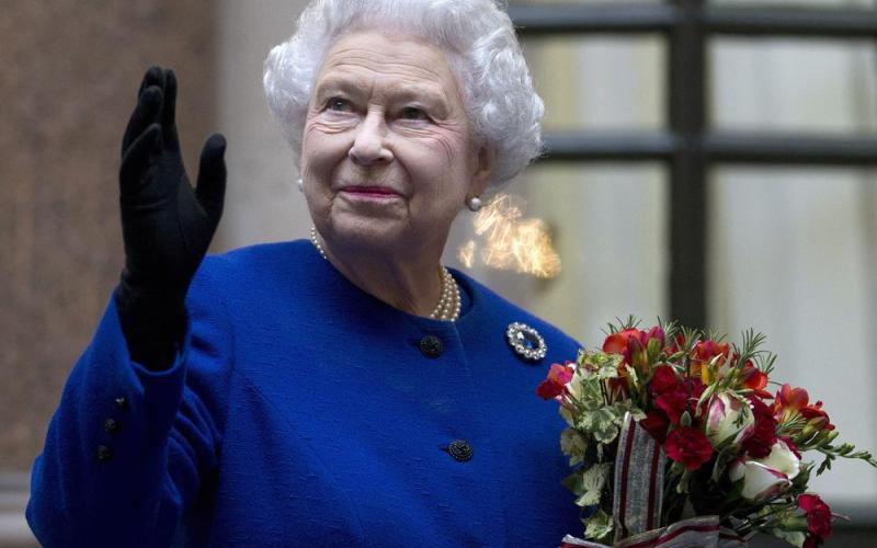 Queen Elizabeth II, waving during an official visit as part of a Jubilee celebration in 2012, died Thursday at the age of 96. (ASSOCIATED PRESS)