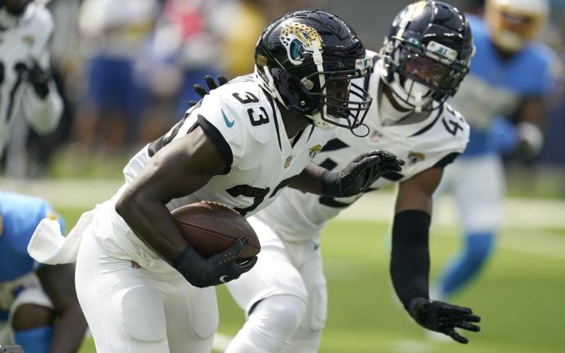 Jacksonville Jaguars linebacker Devin Lloyd runs after intercepting a pass against the Los Angeles Chargers on Sunday in Inglewood, Calif. (MARCIO JOSE SANCHEZ/Associated Press)