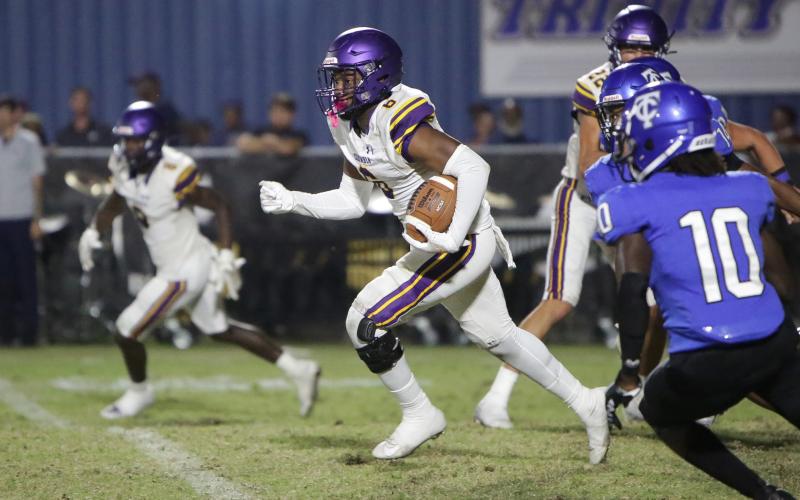 Columbia receiver Tray Tolliver returns a kickoff against Trinity Christian on Friday. (BRENT KUYKENDALL/Lake City Reporter)