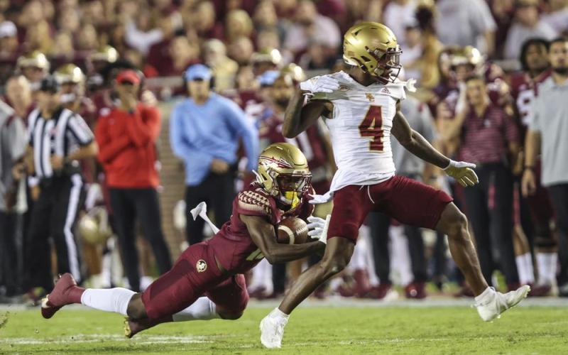 Florida State defensive back Omarion Cooper intercepts a pass intended for Boston College wide receiver Zay Flowers on Sept. 24 in Tallahassee. (GARY MCCULLOUGH/Associated Press)