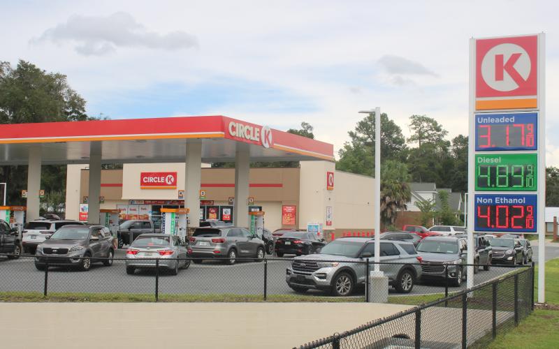 A line of cars wait to fill up at the Circle K gas station at the  intersection of U.S. Highway 90 and Baya Drive Thursday. (TONY BRITT/Lake City Reporter)