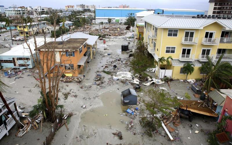 Damaged homes and businesses are seen in Fort Myers Beach on Thursday following Hurricane Ian. (DOUGLAS R. CLIFFORD/Tampa Bay Times via AP)