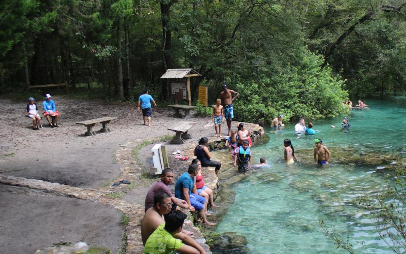 Visitors enjoy the water at Ichetucknee Springs on Memorial Day this past May. (FILE)