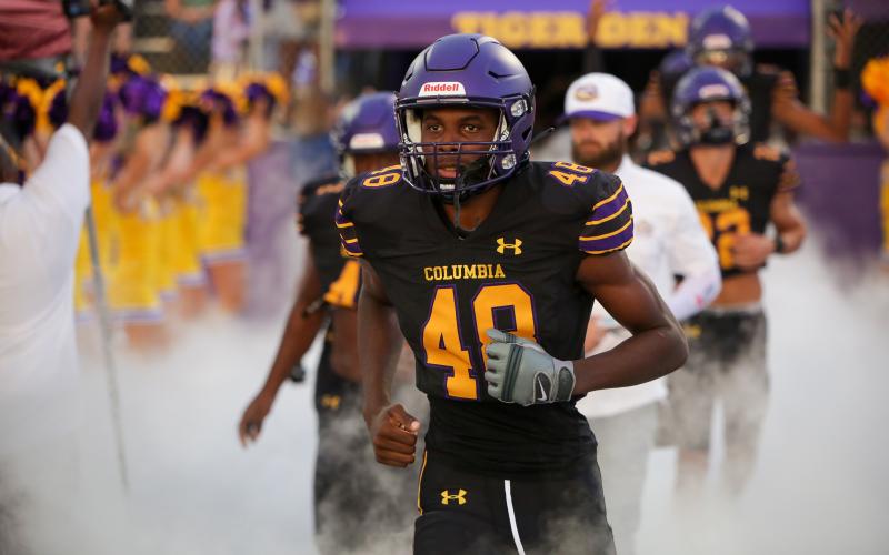 Columbia linebacker Seth Stockton runs onto the field prior to a game against Madison County on Sept. 16. (BRENT KUYKENDALL/Lake City Reporter)