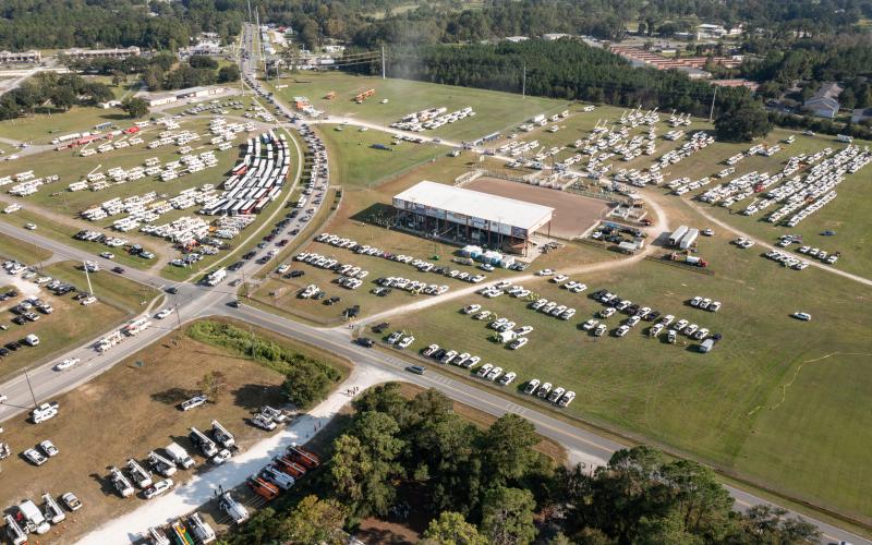 Utility crews from across the country poured into the Florida Gateway Fairgrounds at a Florida Power &amp; Light processing site Monday in preparation for emergency response efforts for Hurricane Ian. (RAY CARPENTER/Special to the Reporter)