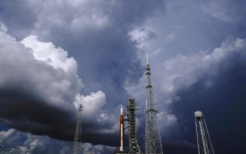 The NASA moon rocket stands on Pad 39B before a launch attempt for the Artemis 1 mission to orbit the moon at the Kennedy Space Center on Sept. 2, 2022, in Cape Canaveral, Fla. NASA mission managers decided Monday, Sept. 26, 2022, to move its moon rocket off the launch pad and into shelter due to Hurricane Ian's uncertain path. (Brynn Anderson/AP File)