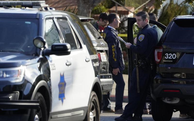 Police investigators work outside the home of Paul Pelosi, the husband of House Speaker Nancy Pelosi, in San Francisco. (ERIC RISBERG/Associated Press)