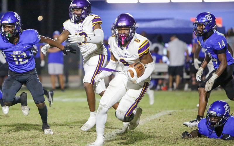 Columbia receiver Tray Tolliver (6) returns a kick against Trinity Christian on Sept. 23. (BRENT KUYKENDALL/Lake City Reporter)