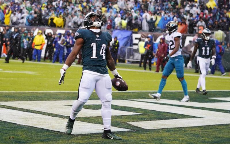 Philadelphia Eagles running back Kenneth Gainwell celebrates scoring a touchdown against the Jacksonville Jaguars on Sunday in Philadelphia. (CHRI SZAGOLA/Associated Press)