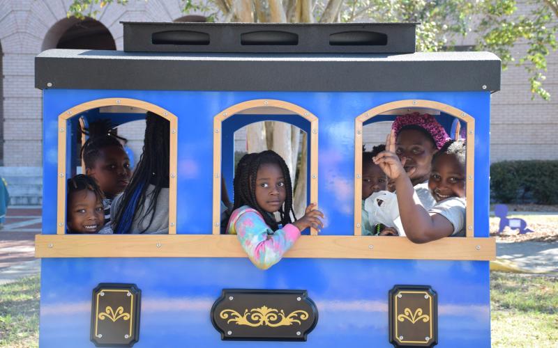 A family rides one of the trains at Florida Gateway College’s Fun in the Park event on Saturday. (COURTESY)