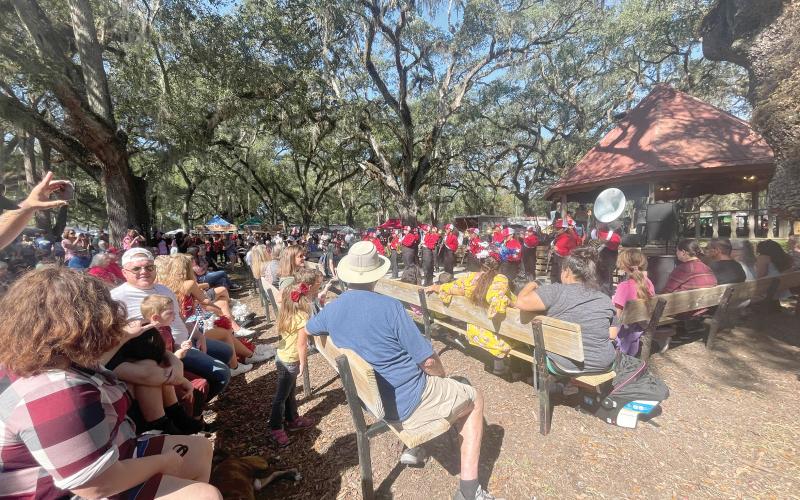 The Lafayette High School marching band performs in front of a crowd Saturday in Veteran’s Memorial Park during the 42nd annual Pioneer Day. (ERIKA CLESI/Special to the Reporter)