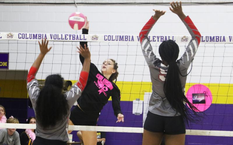 Columbia’s Sinei Wood sends a shot over the net against Bradford on Thursday. (MORGAN MCMULLEN/Lake City Reporter)